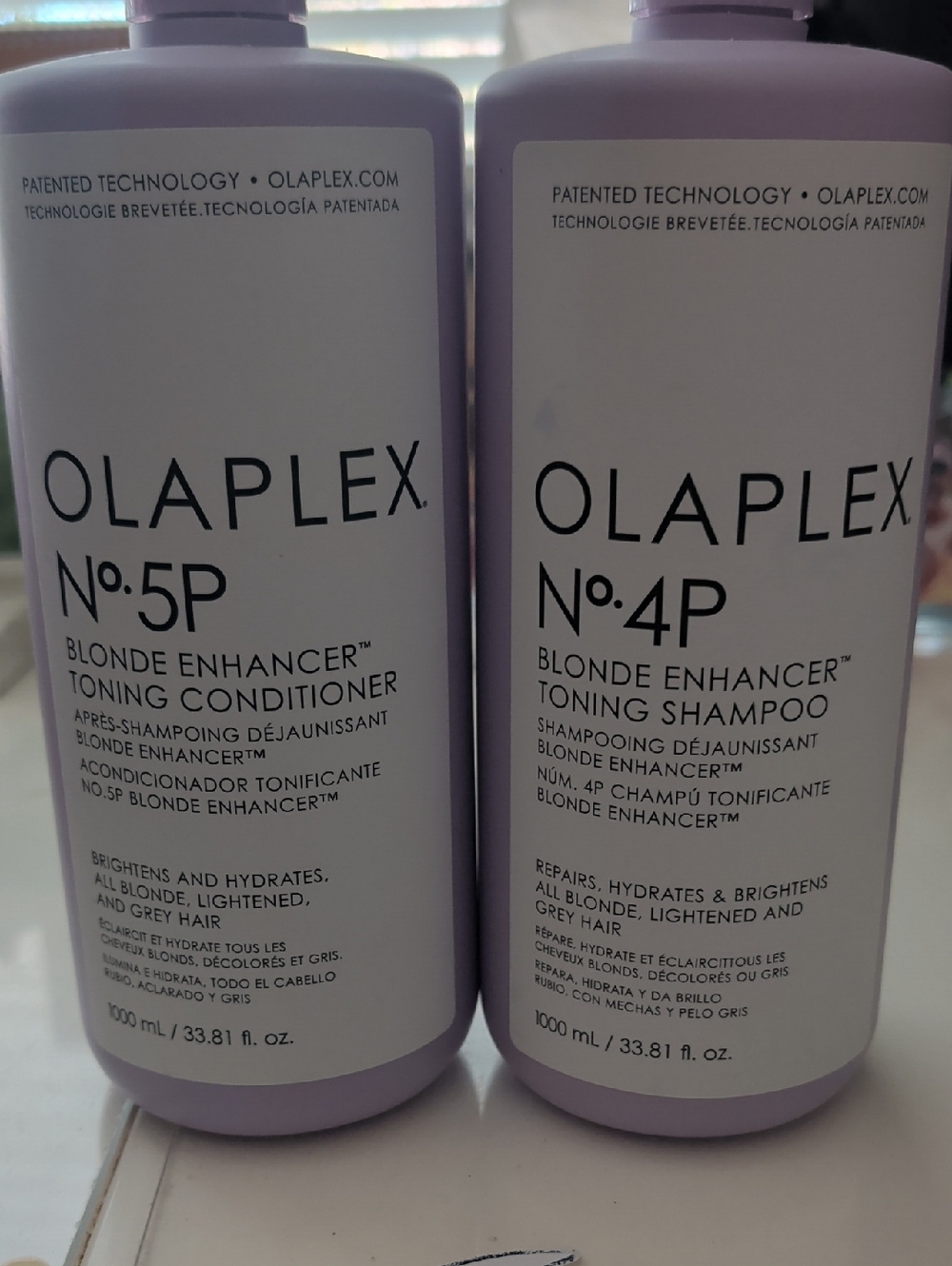 OLAPLEX Blonde Enhancer Duo Shampoo And Conditioner In Lavender, Half Full